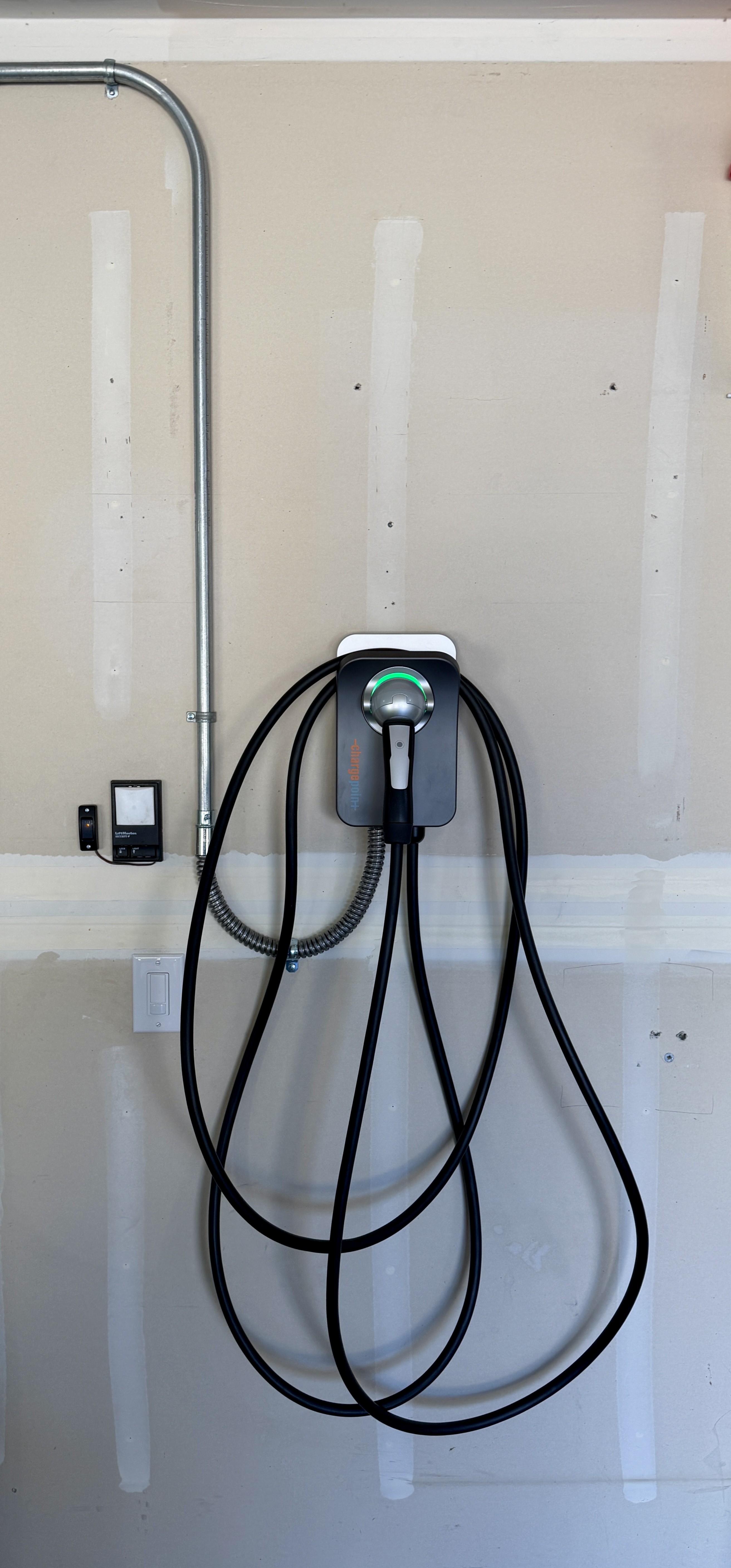 Hardwired 48-amp EV charger on its own dedicated 60-amp circuit